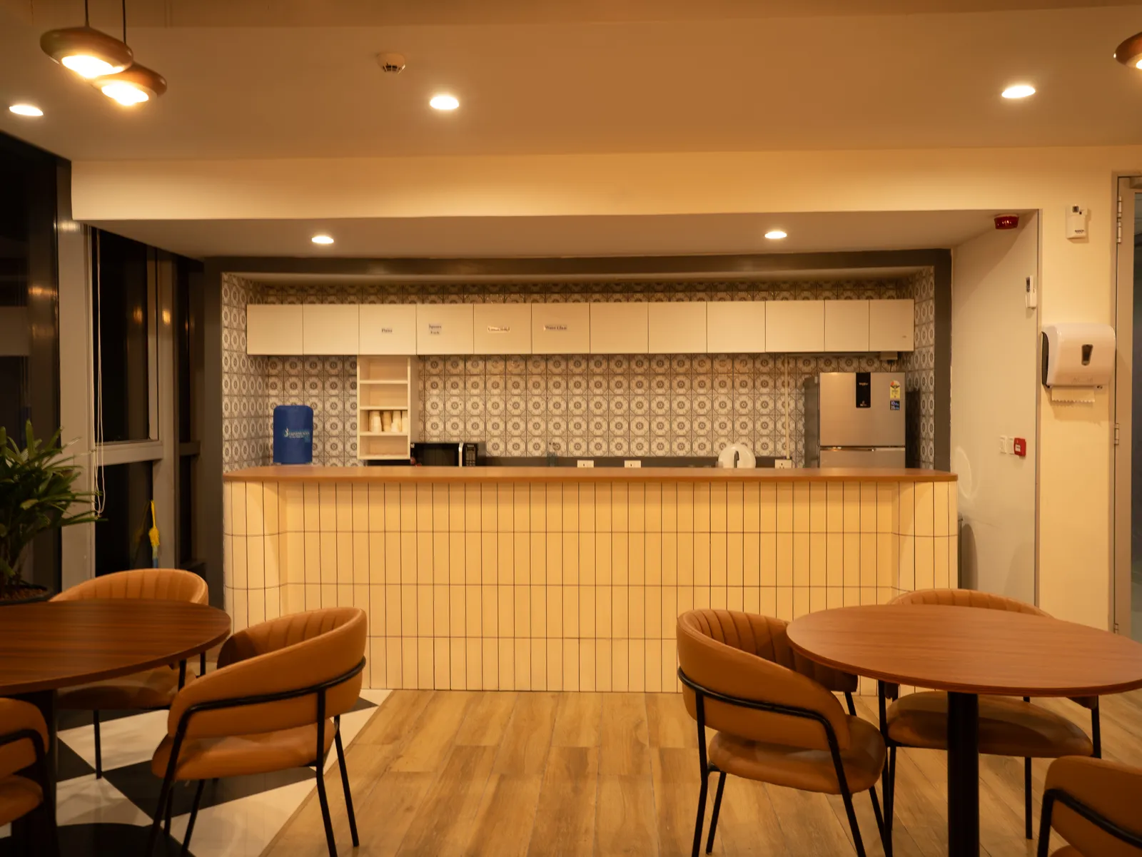 Office café counter with patterned tile backsplash — Moschip
